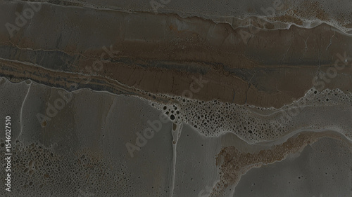 Sophisticated dark gray fluid texture with organic patterns. Captivating design for modern aesthetics. Ideal for stylish backgrounds and decor. Perfect for creative artistic applications.
