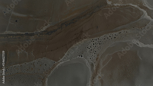 Sophisticated dark gray fluid texture with organic patterns. Captivating design for modern aesthetics. Ideal for stylish backgrounds and decor. Perfect for creative artistic applications.