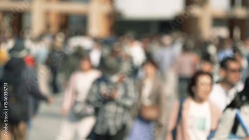 Wallpaper Mural Unfocused blurry crowd of people walking in the street. Slow motion.	
 Torontodigital.ca