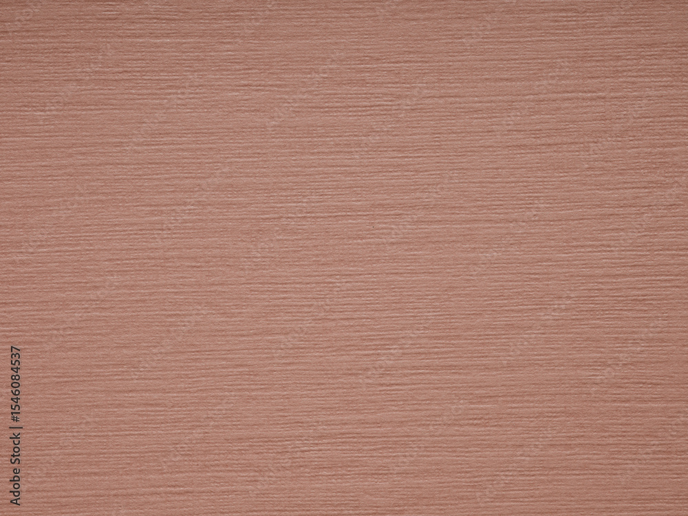 Fototapeta premium A warm terracotta texture infuses this paper with earthy charm and a touch of rustic elegance