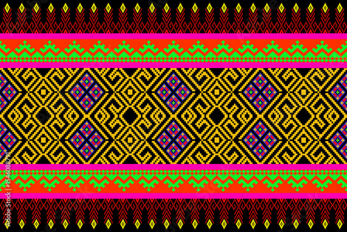 Intricate pixel art pattern featuring traditional Isan textile motifs in gold and black tones. The central diamond shapes are framed by bright red and green tribal borders.