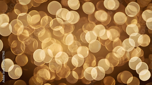 Soft golden bokeh lights background, warm glowing circles of light, elegant and festive, suitable for holiday, celebration, and luxury branding.
