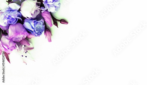 Bouquet of pink roses and alstroemeria on a white background. Delicate flowers. Pastel floral arrangement with a place for text.