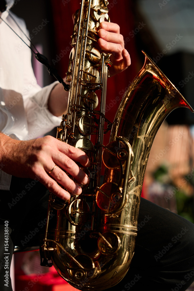 Obraz premium Close-Up of Jazz Musician with Saxophone