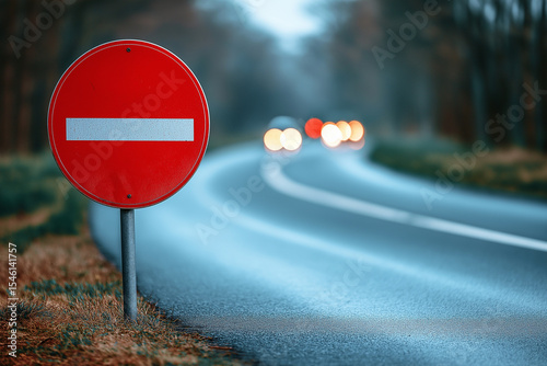Countryside curve with red no entry sign for concepts of warning, stop, and traffic rules

