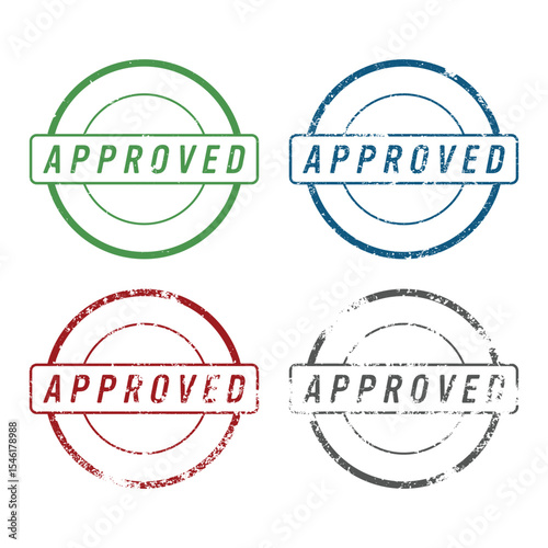 A collection of four distressed rubber stamps with the word "APPROVED" in various colors—green, blue, red, and gray— set against a clean white background. 