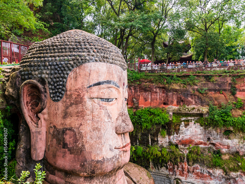 Impressive view of Leshan Giant Buddha, carved directly into the cliff face at the confluence of the Min, Dadu and Qingyi rivers, Sichuan, China