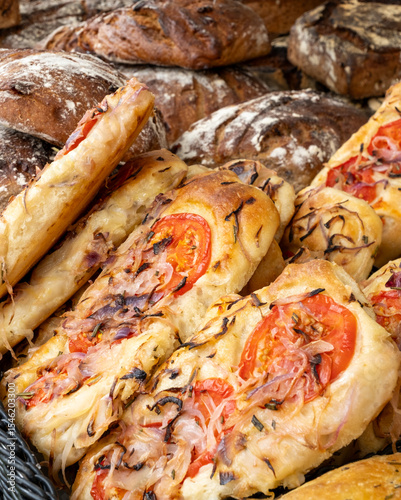 Delicious tomato covered Focaccia On Sale At An Artisan Food Market