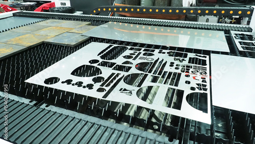 a laser cutting machine processing metal sheets and precisely cutting various shapes