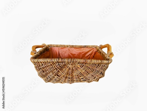 The white background in the picture is a densely woven rattan basket with two wooden handles on each side. It is covered with a reddish brown burlap cloth for beauty and multipurpose use in the home.