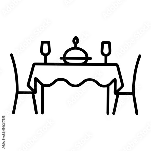 Decorative dining table set with covered dish and glasses  