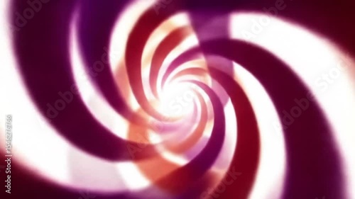 A dynamic abstract spiral design featuring a swirling motion in red, pink, and white tones. The composition creates a sense of motion and energy.