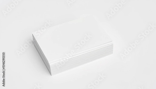 Neat stack of blank white business cards on a plain background,  unbranded,  identity