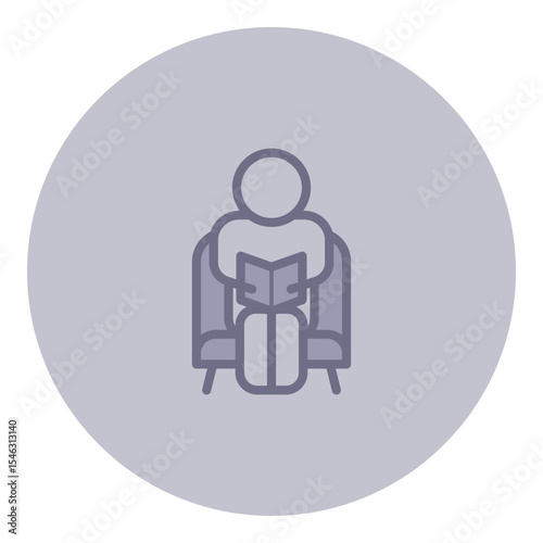 Elderly person sitting in cozy chair, engaged in reading book. Leisure and enjoyment concept