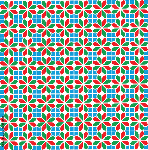 A vibrant, rhythmic floral pattern of red and green petals arranged over a structured blue grid, radiating energy and playful balance.