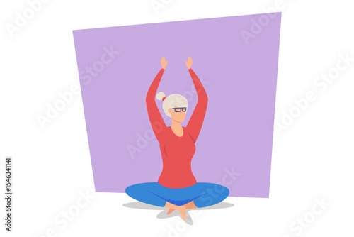 Joyful elderly woman engaged in yoga, stretching her arms upwards while seated cross-legged. Health and wellness concept