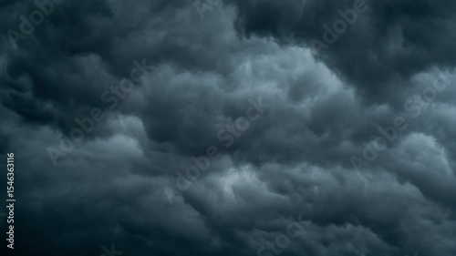 Seamless Thunderstorm Clouds Animation. Looping  video of dark thunderstorm clouds moving dramatically with seamless transition.