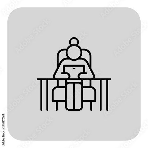 Senior woman focused on digital tablet while seated at modern desk. Productivity and professionalism concept