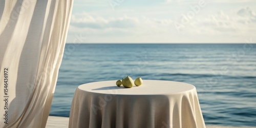 Serene coastal scene featuring a table with limes, evoking relaxation and summer vibes. Perfect for wellness, travel, or hospitality themes.