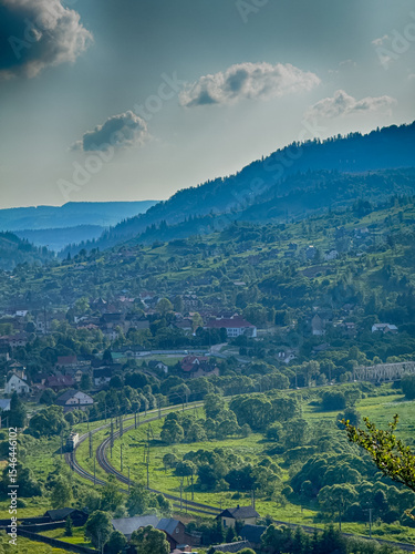 Scenic View of the Carpathian Mountains Covered by Clouds on a Sunny Day