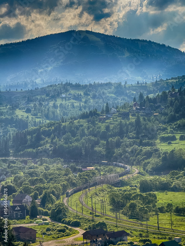 Scenic View of the Carpathian Mountains Covered by Clouds on a Sunny Day
