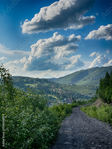 Scenic View of the Carpathian Mountains Covered by Clouds on a Sunny Day