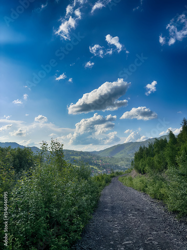 Scenic View of the Carpathian Mountains Covered by Clouds on a Sunny Day
