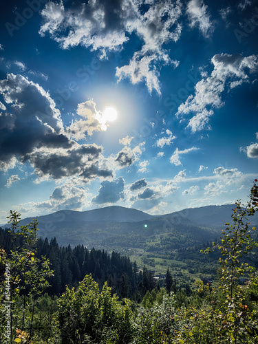 Scenic View of the Carpathian Mountains Covered by Clouds on a Sunny Day