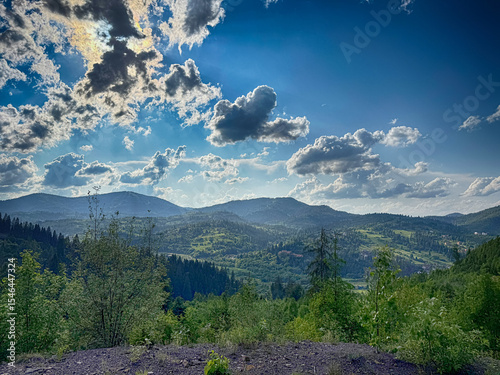 Scenic View of the Carpathian Mountains Covered by Clouds on a Sunny Day