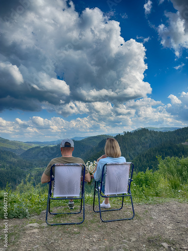 Scenic View of the Carpathian Mountains Covered by Clouds on a Sunny Day