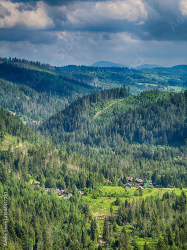 Scenic View of the Carpathian Mountains Covered by Clouds on a Sunny Day