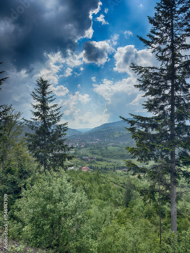 Scenic View of the Carpathian Mountains Covered by Clouds on a Sunny Day