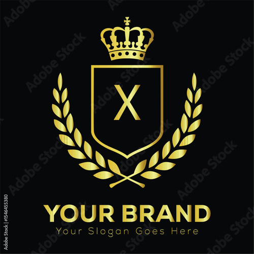 Golden shield and laurel wreath X vector emblem with royal heraldic design