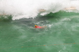 Woman swimming in ocean