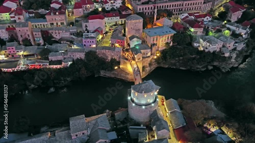 Aerial view on the Old Bridge in Mostar at night, Bosnia and Herzegovina, 4k