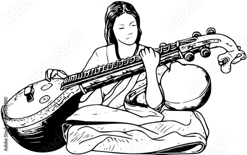 Woman playing a traditional indian veena