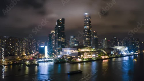Wallpaper Mural Prom night skyline of west Kowloon, glowing with skyscrapers and vibrant waterfront buildings, perfect for cityscape backgrounds and travel publications. Torontodigital.ca