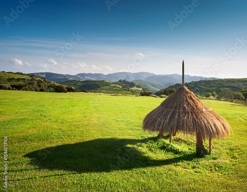 hay feeder stands in lush green meadow at tapada nacional de mafra portugal