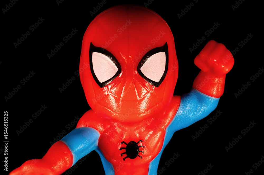 Obraz premium Kinder Surprise Marvel Spider-Man face on a black background