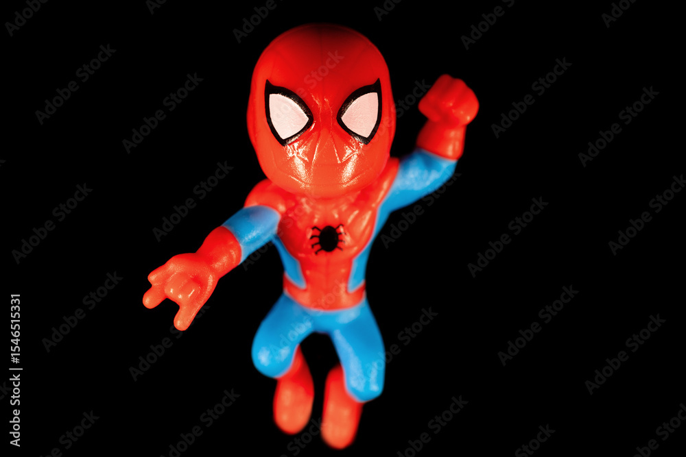 Naklejka premium Kinder Surprise Marvel Spider-Man Peter Parker on the black background