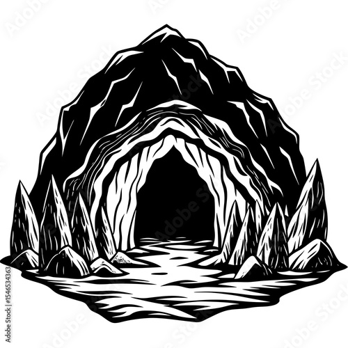 Cave entrance with smooth rocks in a mountain landscape