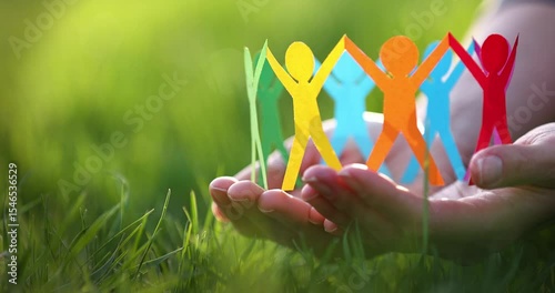 Silhouettes of people of different colors united. Help and protection concept