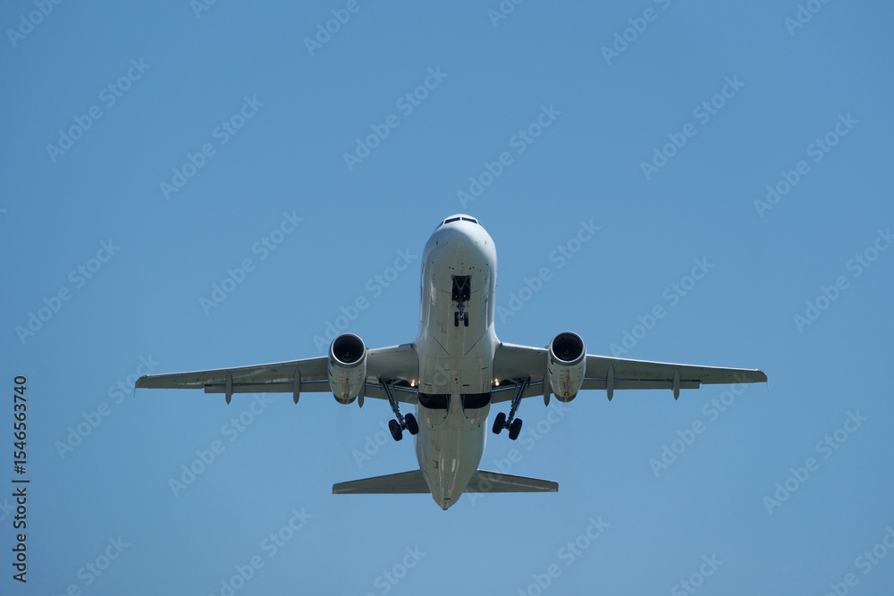 Airplane in the blue sky. Airplane taking off against blue sky Airplane in the blue sky. Airplane taking off against blue sky
