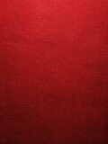beautiful red, ruby red abstract vintage background for design. Fabric cloth canvas texture. Color gradient, ombre. Rough, grain. Matte, shimmer
