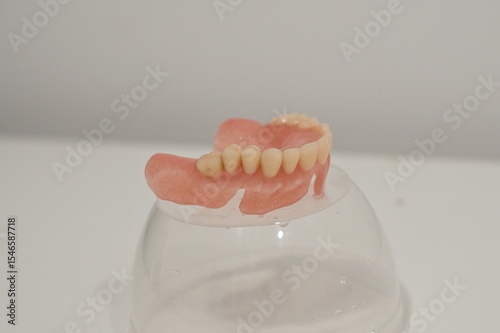 A set of dental dentures on white background