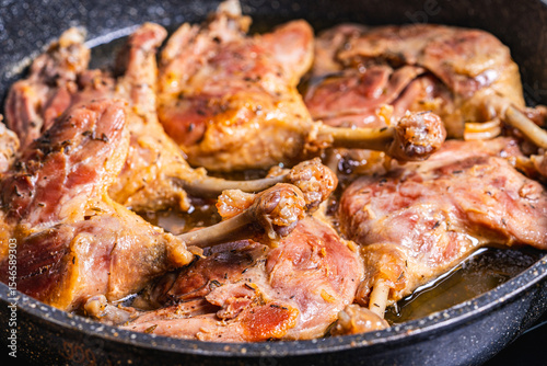 Wallpaper Mural Duck confit is cooked in a pan. Recipe for duck legs. Torontodigital.ca