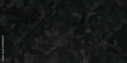 Dark mosaic pattern formation of stone or rock shapes representing a weathered or cracked surface in a uniform tone for texture.