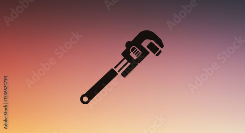 Pipe wrench silhouette on colorful gradient background  