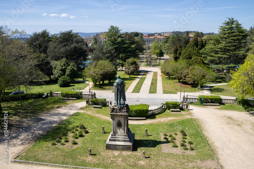 Monument to Manuel Ventura Figueroa at Parque da Alameda balustrade, Santiago de Compostela, Galicia, Spain. Historic city park landmark with classic architecture.