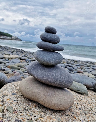 Photography stones on the beach,Stone Tower on the Beach: Balance and Serenity